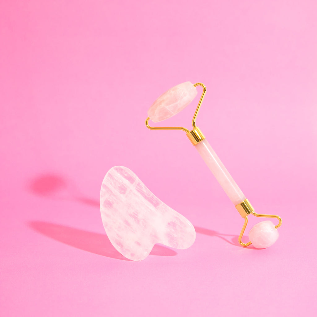 Rouleau de massage facial en quartz rose