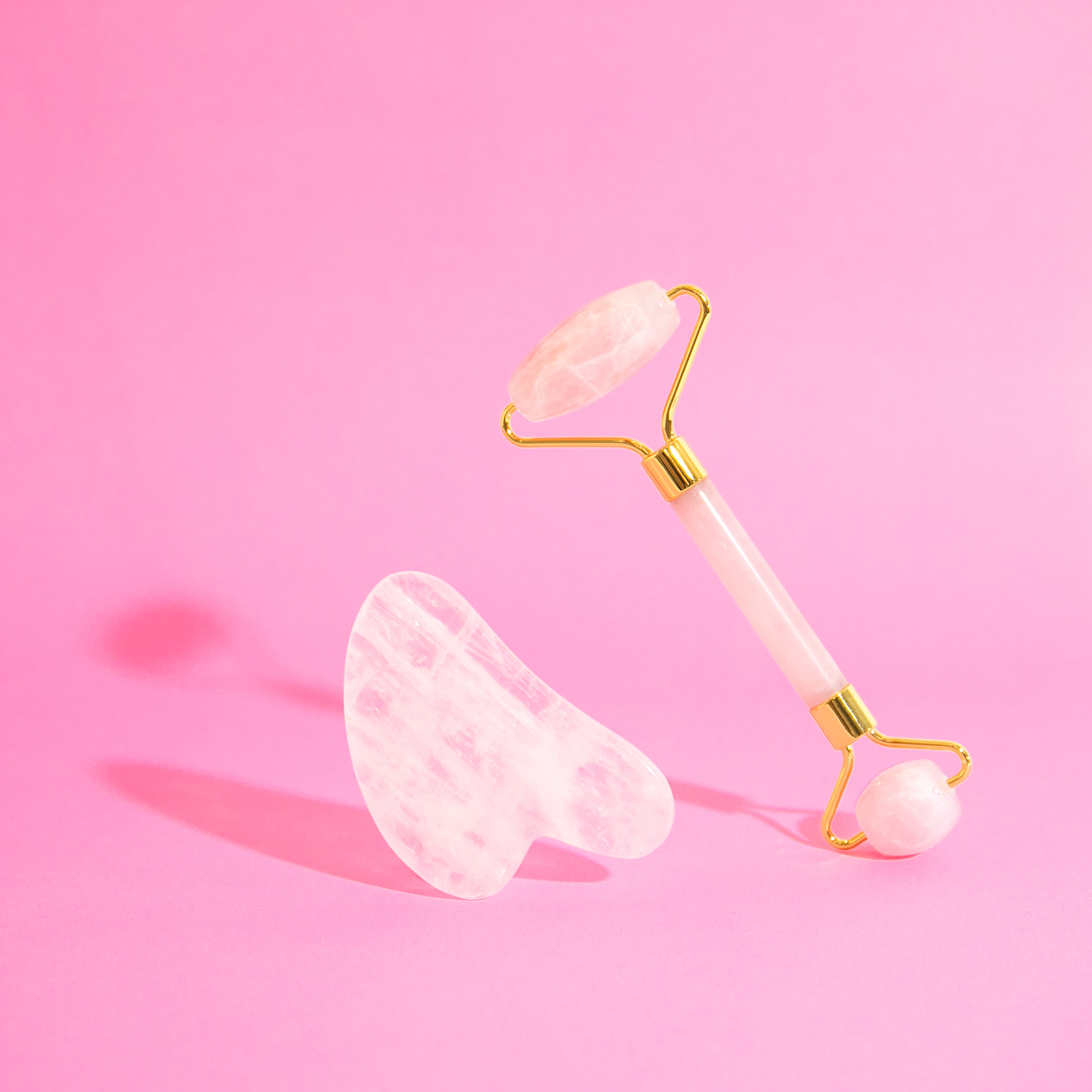 Rouleau de massage facial en quartz rose
